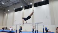A gymnast in action during a training session ahead of the Artistic Gymnastics World Cup Doha 2024. 