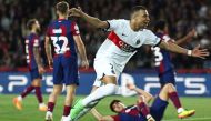 Kylian Mbappe celebrates after scoring his team’s third goal from the penalty spot. AFP