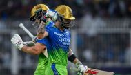 Royal Challengers Bengaluru's Virat Kohli (R) reacts as he walks back to the pavilion after his dismissal during the Indian Premier League (IPL) Twenty20 cricket match between Kolkata Knight Riders and Royal Challengers Bengaluru at the Eden Gardens in Kolkata on April 21, 2024. (Photo by DIBYANGSHU SARKAR / AFP)