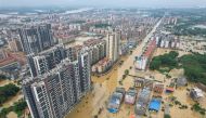 This aerial photo taken on April 22, 2024 shows a general view of flooded buildings and streets after heavy rains in Qingyuan city, in China southern Guangdong province. Photo by CNS / AFP.