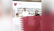 President of Qatar Chess Federation Mohammed Al Madhahka with gold medal winner Khaled Al Jamaat (left) and Rawda Al Qasabi, who claimed bronze medal. 