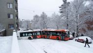 A bus blocks a street during a snowy spring day in Helsinki, Finland, on April 23, 2024. Photo by Teemu Salonen / Lehtikuva / AFP