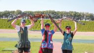 Slovakia’s Zuzana Stefecekova (centre) celebrates after winning the Final Olympic Qualification Shotgun Championship at the Lusail Shooting Complex yesterday. Australia’s Laetisha Scanlan (left) finished second while her compatriot Penny Smith was third.
