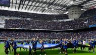 Inter Milan's players celebrate the scudetto at the end of the Italian Serie A football match between Inter Milan and Torino at the San Siro Stadium in Milan, on April 28, 2024. Inter clinched their 20th Scudetto with a 2-1 victory over AC Milan on April 22, 2024. (Photo by Piero CRUCIATTI / AFP)
