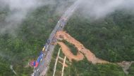 This photo taken on May 1, 2024 shows an aerial view of a collapsed section of a highway near Meizhou, in southern China痴 Guangdong province. (Photo by CNS / CNS / AFP) 