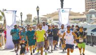 Qatar stars Mutaz Barshim, Almoez Ali and Abdulla Al Tamimi compete alongside others during an earlier edition of the Wings for Life World Run.