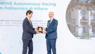 Ambassador of Italy to the State of Qatar H E Paolo Toschi (left)awarding Prof Sergio Savaresi of Polytechnic University of Milan the AEMOB Tech Innovation Excellence Award.