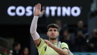 Spain's Carlos Alcaraz gestures after losing against Russia's Andrey Rublev during the 2024 ATP Tour Madrid Open tournament quarter-final tennis match at Caja Magica in Madrid on May 1, 2024. (Photo by Thomas COEX / AFP)