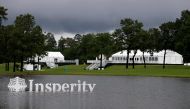 THE WOODLANDS, Texas - MAY 3: A general view of Insperity signage in the water on the 18th hole during the first round of the Insperity Invitational at The Woodlands Golf Club on May 3, 2024 in The Woodlands, Texas. Aaron M. Sprecher/Getty Images/AFP (Photo by Aaron M. Sprecher / GETTY IMAGES NORTH AMERICA / Getty Images via AFP)