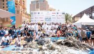 UDC officials with some of the individuals who took part in the seabed cleaning campaign.