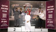 Qatar Racing Club Director Sheikh Jabor bin Khalid Al Thani with the podium winners of the fifth round of Qatar Freestyle Drifting Championship.