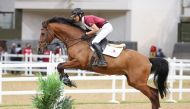 Action during the Al Shaqab League Show Jumping Championship at Longines Indoor Arena. 