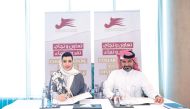 Aisha Alfardan, Vice Chairwoman of QBWA, and Mohamed Al Naimi, CEO of AMLAK Holding during the MoU signing.