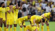 Nassr's players react in the penalty shootout during the King's Cup final match between Al-Nassr and Al-Hilal at the King Abdullah Sport City Stadium in Jeddah on May 31, 2024. (Photo by AFP)