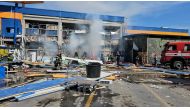 A handout picture made available by Emergency Situations Inspectorate (ISU) Botosani shows Romanian rescue workers intervening on the site of a strong explosion at a commercial center in Botosani, Romania, on June 7, 2024. Photo by ISU BOTOSANI / AFP