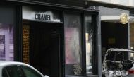 A photo shows a Chanel boutique near the Champs-Elysees avenue in Paris that was attacked with a ram car by a team of escaped robbers, police sources said, on June 10, 2024. (Photo by Dimitar DILKOFF / AFP)