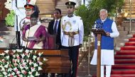 India's Bharatiya Janata Party (BJP) leader, Narendra Modi (R) takes the oath of office for a third term as the country's Prime Minister during the oath-taking ceremony administered by President Droupadi Murmu (2L) at presidential palace Rashtrapati Bhavan in New Delhi on June 9, 2024. Photo by Money SHARMA / AFP