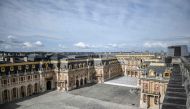 A picture taken on April 6, 2021 shows a partial view of the Chateau de Versailles (Palace of Versailles) in Versailles, outside Paris. Photo by STEPHANE DE SAKUTIN / AFP
