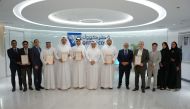 CEO of Qatar Cool, Yasser Al Jaidah along with other officials during the recognition ceremony.