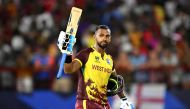 West Indies' Nicholas Pooran reacts after being run out during the ICC men's Twenty20 World Cup 2024 in Gros Islet, St. Lucia, June 17, 2024. (Photo by Timothy A. Clary / AFP)