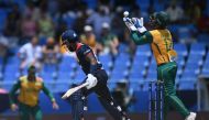 South Africa's Quinton de Kock (R) celebrates catching out USA's Aaron Jones during the ICC men's Twenty20 World Cup 2024 Super Eight cricket match between the United States and South Africa at Sir Vivian Richards Stadium in North Sound, Antigua and Barbuda on June 19, 2024. (Photo by ANDREW CABALLERO-REYNOLDS / AFP)