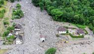 This aerial photograph shows a view of the hamlet of Sorte, south of Lostallo in the Moesa Region in the Swiss canton of Graubunden (Grisons) after violent downpours caused floods and landslides on June 23, 2024. (Photo by Piero CRUCIATTI / AFP)
