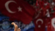 Turkiye's defender #03 Merih Demiral celebrates after scoring his team's second goal during the UEFA Euro 2024 round of 16 football match between Austria and Turkiye at the Leipzig Stadium in Leipzig on July 2, 2024. (Photo by Adrian DENNIS / AFP)