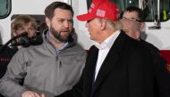 (FILES) US Senator JD Vance (R-OH) (L) shakes hands with former US President Donald Trump during an event at the East Palestine Fire Department in East Palestine, Ohio, on February 22, 2023. July 15, Trump announces Ohio Senator J.D. Vance as running mate (Photo by Rebecca DROKE / AFP)
