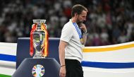 (FILES) England's head coach Gareth Southgate walks with his silver medal past to the trophy after the UEFA Euro 2024 final football match between Spain and England at the Olympiastadion in Berlin on July 14, 2024. (Photo by JAVIER SORIANO / AFP)
