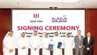 Milaha and Qatar Steel officials during the signing ceremony.