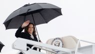 Vice President Kamala Harris waves as she boards Air Force Two at Joint Base Andrews in Maryland on July 22, 2024. (Photo by Erin Schaff / POOL / AFP)

