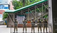 Bangladesh army stand guard at a metro station as the curfew is relaxed after the anti-quota protests, in Dhaka on July 27, 2024. (Photo by Munir Uz Zaman / AFP)