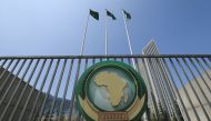 File: The African Union logo is seen outside the AU headquarters building in Addis Ababa, Ethiopia, on November 8, 2021.

