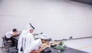 Aspire Summer Camp participants engage in an activity at the Al Hadaf Shooting Range for boys. 