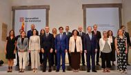 Newly elected Catalonia's regional government head Salvador Illa (C) and regional government members pose on August 12, 2024 at the Palau de la Generalitat in Barcelona, as the new Government of Catalonia take office. (Photo by MANAURE QUINTERO / AFP)
