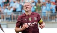 Manchester City's forward #09 Erling Haaland smiles after scoring his third goal during the second half of the pre-season club friendly football match between Chelsea FC and Manchester City FC at Ohio Stadium in Columbus, Ohio on August 3 2024. (Photo by KAMIL KRZACZYNSKI / AFP)