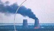 This video grab taken from a handout footage released by the Ukrainian Presidential Press Service on August 11, 2024, shows a fire at a cooling tower of the Russian-controlled Zaporizhzhia nuclear power plant in Energodar, Southern Ukraine. (Photo by Handout / UKRAINIAN PRESIDENTIAL PRESS SERVICE / AFP)


