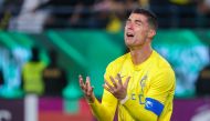 (FILES) Nassr's Portuguese forward #07 Cristiano Ronaldo reacts during the AFC Champions League football match between Saudi Arabia's Al-Nassr and UAE's Al-Ain at Al-Awal Park Stadium in Riyadh on March 11, 2024. (Photo by Fayez Nureldine / AFP)

