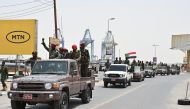 Members of Sudan's armed forces take part in a military parade held on the occasion of Army Day in Port Sudan on August 14, 2024. (Photo by AFP)