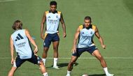 (From L) Real Madrid's Croatian midfielder #10 Luka Modric, Real Madrid's Brazilian forward #11 Rodrygo and Real Madrid's French forward #10 Kylian Mbappe attend a training session with teammates at the training ground of Valdebebas on the eve of their Liga football match against RCD Mallorca, in Madrid on August 17, 2024. (Photo by JAVIER SORIANO / AFP)
