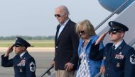 US President Joe Biden and First Lady Jill Biden steps off Air Force One at Joint Base Andrews, Maryland, on August 18, 2024. (Photo by ROBERTO SCHMIDT / AFP)
