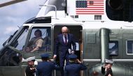 US President Joe Biden arrives to board Air Force One as he depart Joint Base Andrews in Maryland on August 19, 2024. (Photo by Brendan Smialowski / AFP)
