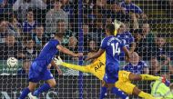 Leicester City's English striker #09 Jamie Vardy (L) heads the ball past Tottenham Hotspur's Italian goalkeeper #01 Guglielmo Vicario for their first goal during the English Premier League football match between Leicester City and Tottenham Forest at King Power Stadium in Leicester, central England on August 19, 2024. (Photo by Darren Staples / AFP)