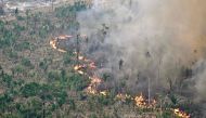 Aerial view of an area of Amazon rainforest deforested by illegal fire in the municipality of Labrea, Amazonas State, Brazil on August 20, 2024. (Photo by EVARISTO SA / AFP)