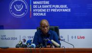 Democratic Republic of Congo Health minister Samuel-Roger Kamba addresses a press conference in Kinshasa on August 19, 2024 Cases of the mpox virus are rising in Democratic Republic of Congo (DRC), as the central African country awaits vaccines from the United States and Japan, the health minister said on Monday. Photo by Hardy_Bope / AFP.