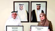 Expo 2023 Doha Secretary General Dr. Fayqa Ashkanani (right) and GORD Chairman 
Dr. Yousef Alhorr with the certificates.