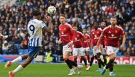 Brighton's Brazilian striker #09 Joao Pedro headers the ball to scores the team's second goal during the English Premier League football match between Brighton and Hove Albion and Manchester United at the American Express Community Stadium in Brighton, southern England on August 24, 2024. (Photo by Glyn KIRK / AFP) /
