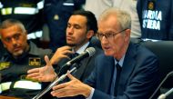 The chief of the public prosecutor's office of Termini Imerese Ambrogio Cartosio speaks next to Italian prosecutor Raffaele Cammarano during a press conference on August 24, 2024 in Termini Imerese, Sicily. (Photo by Alessandro FUCARINI / AFP)

