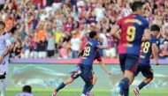 Barcelona's Spanish forward #19 Lamine Yamal celebrates scoring the opening goal during the Spanish league football match between FC Barcelona and Athletic Club Bilbao at the Estadi Olimpic Lluis Companys in Barcelona on August 24, 2024. (Photo by LLUIS GENE / AFP)
