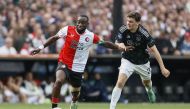 (FILES) Feyenoord's Dutch defender #04 Lutsharel Geertruida (L) and Ajax's Bosnian midfielder #33 Benjamin Tahirovic (R) fight for the ball during the Dutch Eredivisie football match between Feyenoord and Ajax at the Feyenoord De Kuip stadium in Rotterdam, on April 7, 2024. (Photo by Pieter Stam de Jonge / ANP / AFP) 